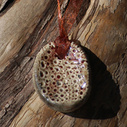 perle blanche en céramique raku